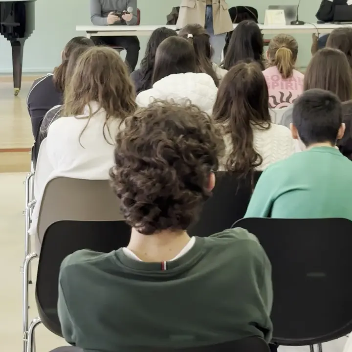 Students in a classroom during a financial education session